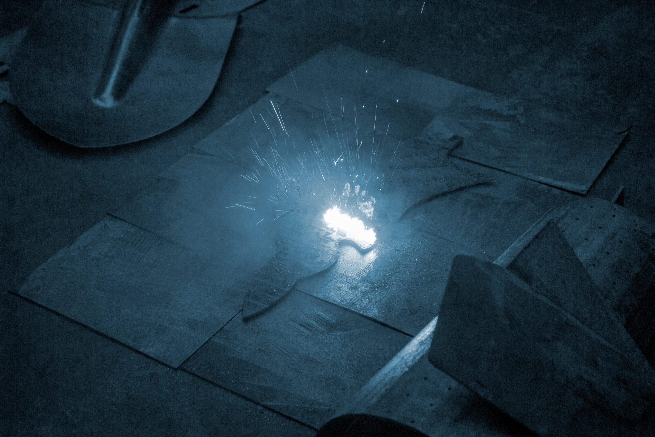 Laser cleaning of metal. The laser beam cleans the metal surface from rust. Laser cleaning of metal. The laser beam cleans the metal surface from rust. Laser removes removing old rust from metal. Innovation metalworking. New technologies