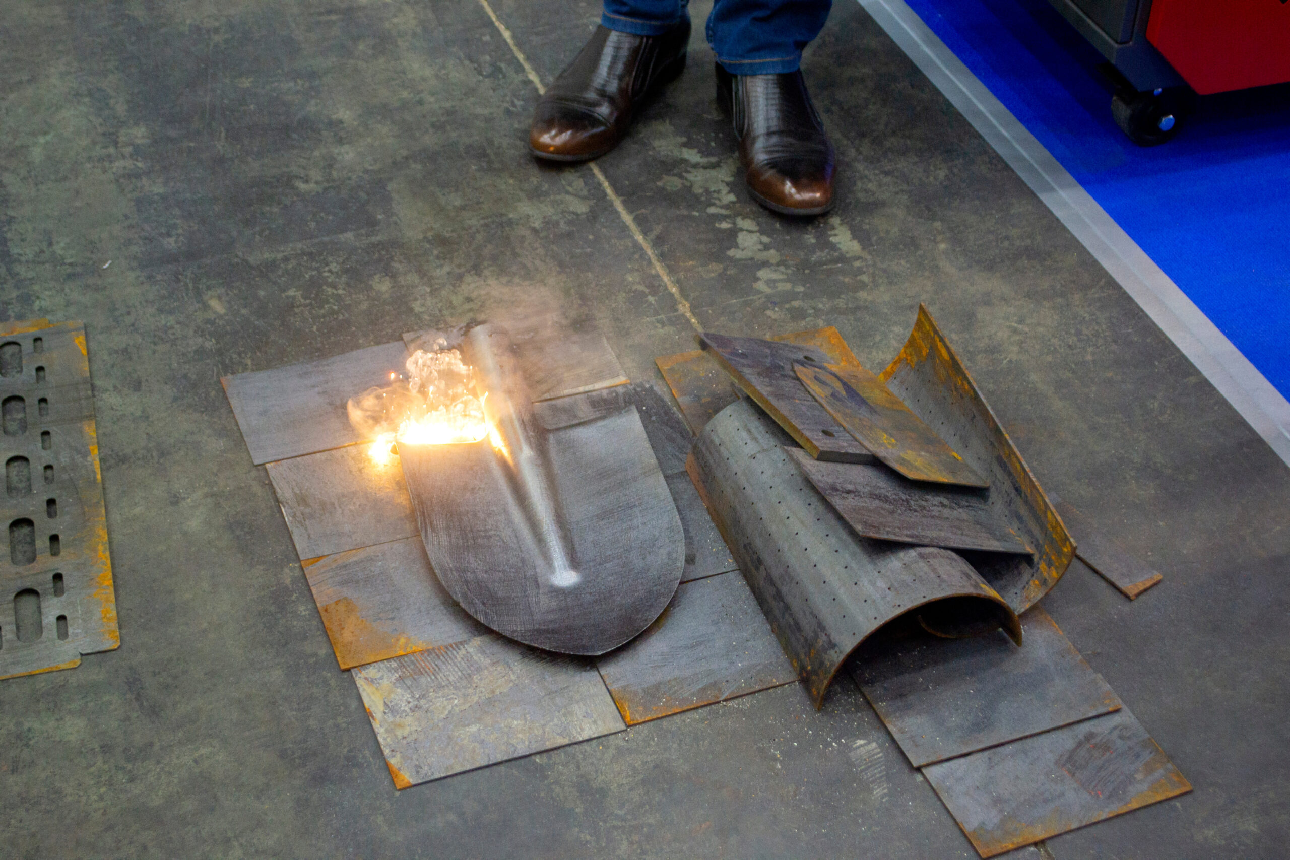 Laser cleaning of metal. The laser beam cleans the metal surface from rust. Laser cleaning of metal. Laser removes removing old rust from metal. The laser beam cleans the metal surface from rust. New technologies. Innovation metalworking.